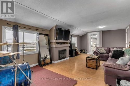 656 County 8 Road, Greater Napanee, ON - Indoor Photo Showing Living Room With Fireplace