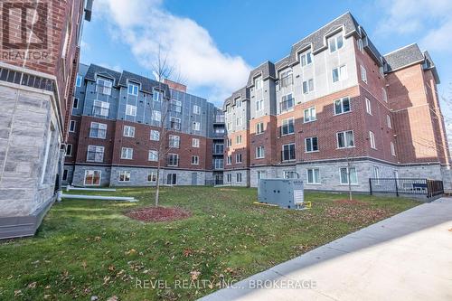 220 - 501 Frontenac Street, Kingston (East Of Sir John A. Blvd), ON - Outdoor With Facade