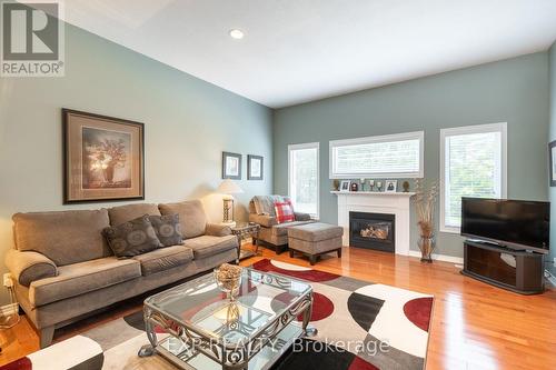 129 Simcoe Avenue, Middlesex Centre (Komoka), ON - Indoor Photo Showing Living Room With Fireplace