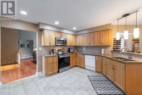 129 Simcoe Avenue, Middlesex Centre (Komoka), ON - Indoor Photo Showing Kitchen With Double Sink