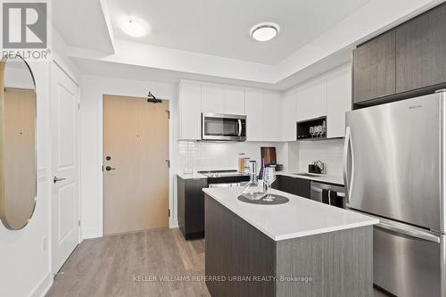 324 - 202 Burnhamthorpe Road E, Mississauga, ON - Indoor Photo Showing Kitchen With Stainless Steel Kitchen