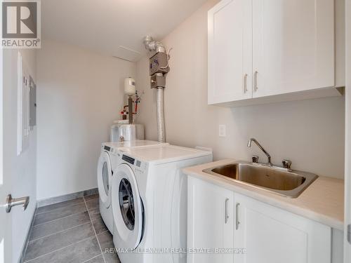 520 - 830 Megson Terrace, Milton, ON - Indoor Photo Showing Laundry Room