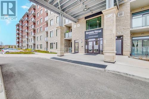 520 - 830 Megson Terrace, Milton, ON - Outdoor With Balcony With Facade