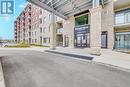 520 - 830 Megson Terrace, Milton, ON  - Outdoor With Balcony With Facade 