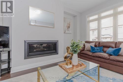 12 Enclave Trail, Brampton, ON - Indoor Photo Showing Living Room With Fireplace