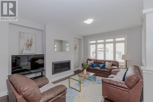 12 Enclave Trail, Brampton, ON - Indoor Photo Showing Living Room With Fireplace