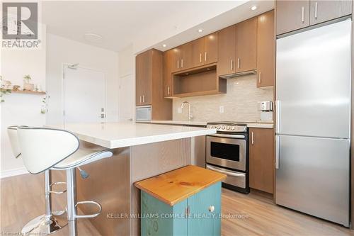 221 - 457 Plains Road E, Burlington, ON - Indoor Photo Showing Kitchen With Upgraded Kitchen