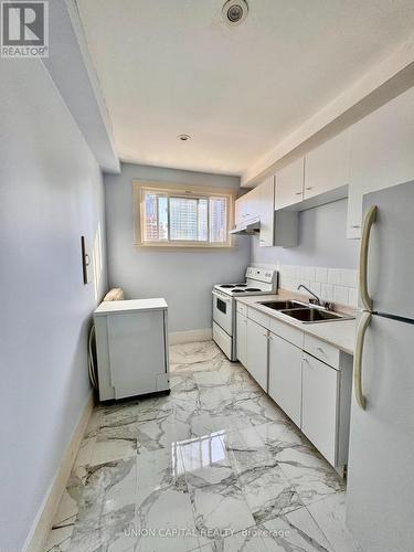 24 - 285 King Street W, Hamilton, ON - Indoor Photo Showing Kitchen With Double Sink