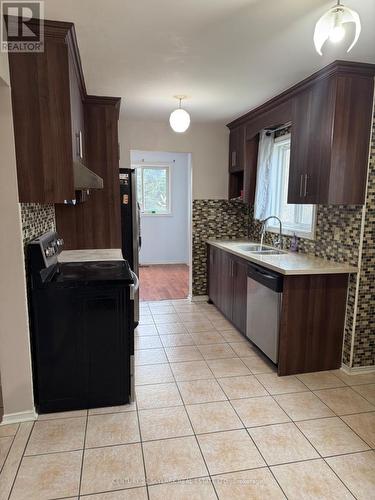 24 Sparrow Court, Brampton, ON - Indoor Photo Showing Kitchen With Double Sink