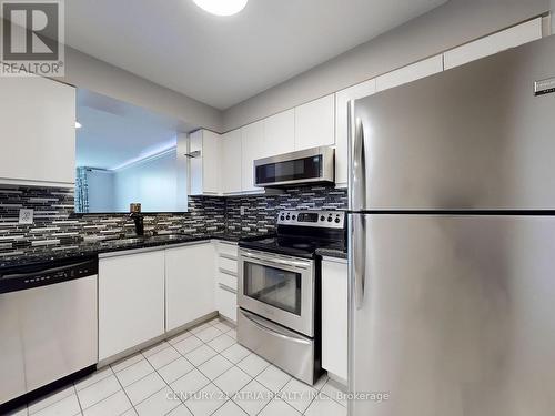 104 - 480 Mclevin Avenue, Toronto, ON - Indoor Photo Showing Kitchen With Upgraded Kitchen