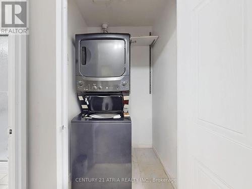 104 - 480 Mclevin Avenue, Toronto, ON - Indoor Photo Showing Laundry Room