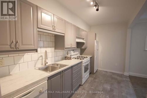 Main Fl - 35 St Quentin Avenue, Toronto, ON - Indoor Photo Showing Kitchen With Double Sink