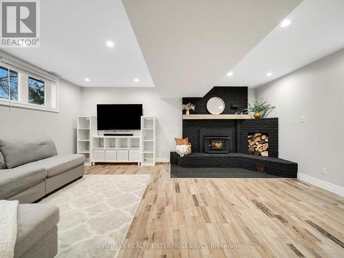 35 Wasslow Avenue, Georgina, ON - Indoor Photo Showing Living Room With Fireplace