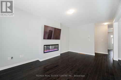 53 Block Road N, Brampton, ON - Indoor With Fireplace