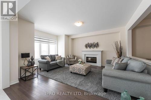 15 Eberly Woods Drive, Caledon, ON - Indoor Photo Showing Living Room With Fireplace