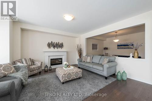 15 Eberly Woods Drive, Caledon, ON - Indoor Photo Showing Living Room With Fireplace