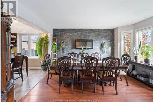 2 Goslin Court, Leamington, ON - Indoor Photo Showing Dining Room With Fireplace