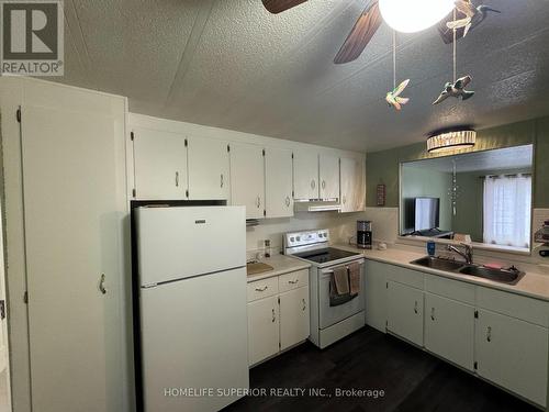 72B - 2244 Heritage Line, Otonabee-South Monaghan, ON - Indoor Photo Showing Kitchen With Double Sink