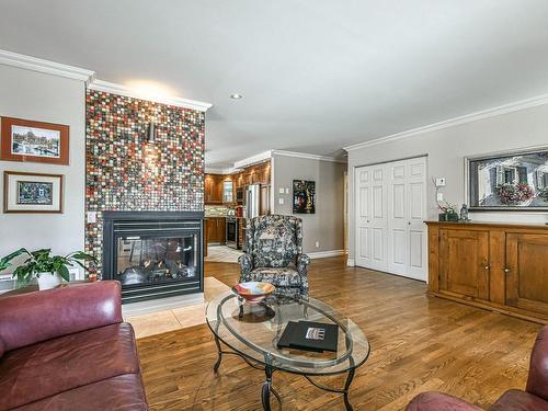 Salon - 112 Place Des Geais-Bleus, Piedmont, QC - Indoor Photo Showing Living Room With Fireplace