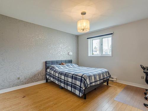 Master bedroom - 14816 Rue Notre-Dame E., Montréal (Rivière-Des-Prairies/Pointe-Aux-Trembles), QC - Indoor Photo Showing Bedroom