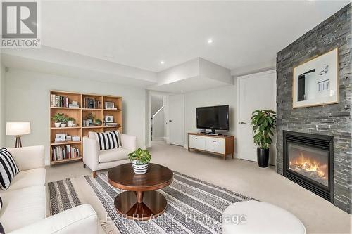 1304 Avenue P Avenue, Ottawa, ON - Indoor Photo Showing Living Room With Fireplace