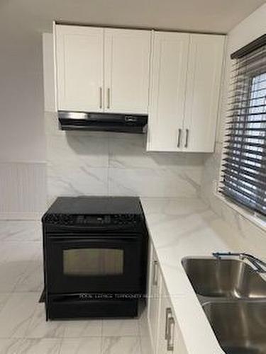 A-51 Windermere Crct, Brampton, ON - Indoor Photo Showing Kitchen With Double Sink