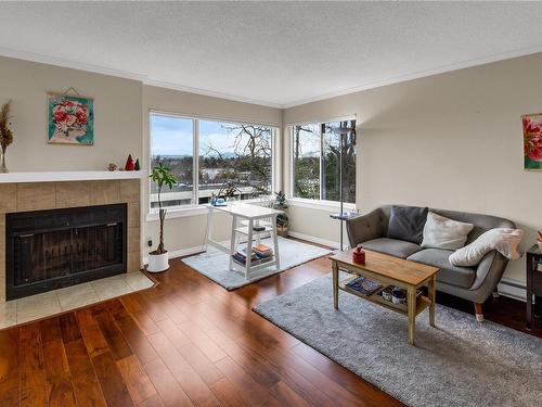 308-3260 Quadra St, Saanich, BC - Indoor Photo Showing Living Room With Fireplace