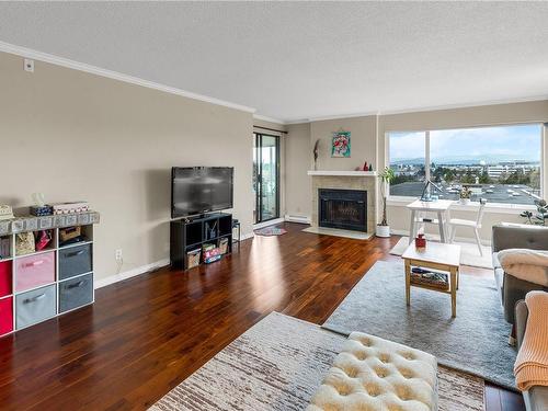 308-3260 Quadra St, Saanich, BC - Indoor Photo Showing Living Room With Fireplace