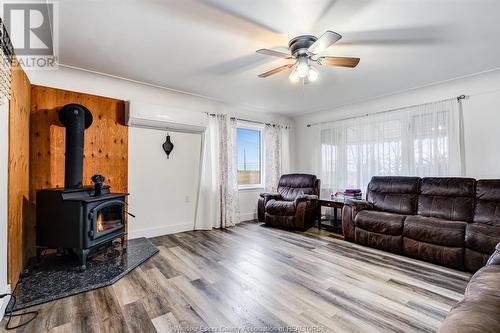 1148 Highway 77, Leamington, ON - Indoor Photo Showing Living Room With Fireplace