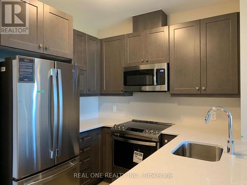 417 - 95 Dundas Street W, Oakville, ON - Indoor Photo Showing Kitchen With Stainless Steel Kitchen