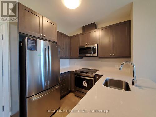 417 - 95 Dundas Street W, Oakville, ON - Indoor Photo Showing Kitchen With Stainless Steel Kitchen