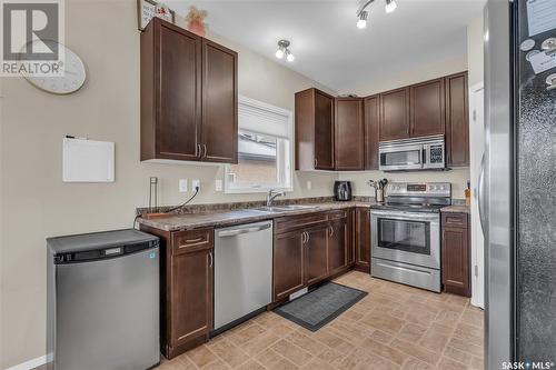 138 Allwood Crescent, Saskatoon, SK - Indoor Photo Showing Kitchen With Stainless Steel Kitchen With Double Sink