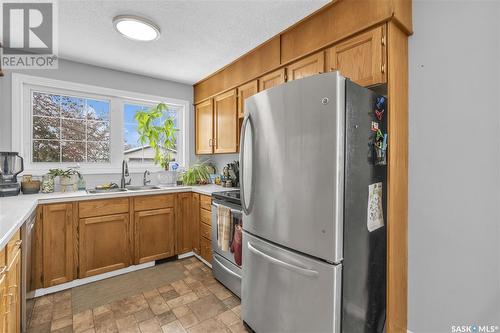 51 Boucher Crescent, Regina, SK - Indoor Photo Showing Kitchen With Double Sink