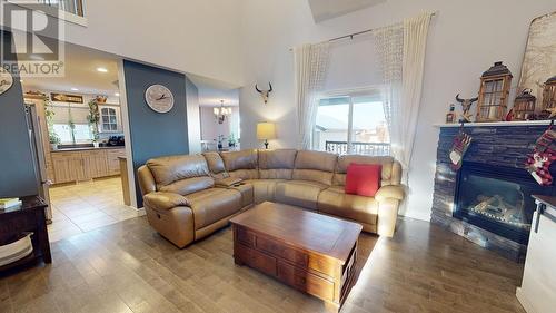 8708 113A Avenue, Fort St. John, BC - Indoor Photo Showing Living Room With Fireplace