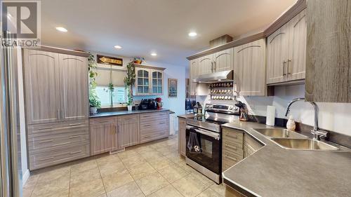 8708 113A Avenue, Fort St. John, BC - Indoor Photo Showing Kitchen With Double Sink