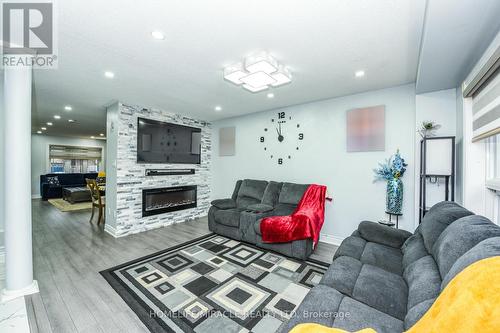 94 Saintsbury Crescent, Brampton, ON - Indoor Photo Showing Living Room With Fireplace