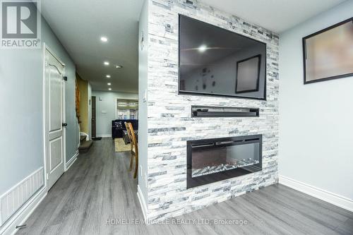 94 Saintsbury Crescent, Brampton, ON - Indoor Photo Showing Living Room With Fireplace