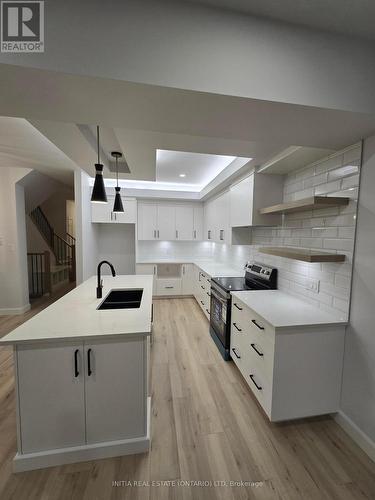 99 - 2700 Buroak Drive, London, ON - Indoor Photo Showing Kitchen With Double Sink