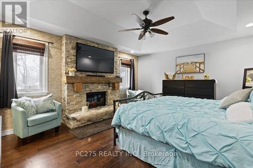 1163 Crumlin Side Road, London, ON - Indoor Photo Showing Bedroom With Fireplace