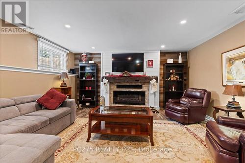 1163 Crumlin Side Road, London, ON - Indoor Photo Showing Living Room With Fireplace