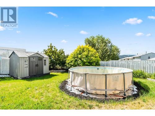 443 Opal Drive, Logan Lake, BC - Outdoor With Above Ground Pool With Backyard