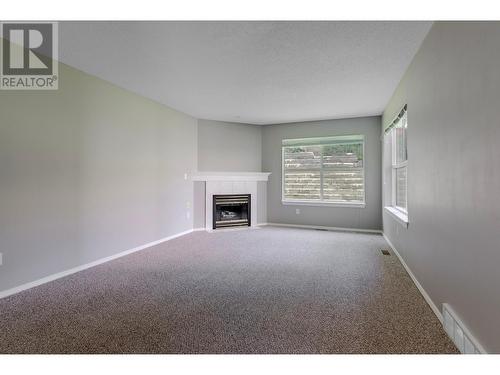 1920 Hugh Allan Drive Unit# 9, Kamloops, BC - Indoor With Fireplace