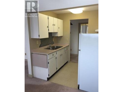 308 Chartrand Avenue Unit# 218, Logan Lake, BC - Indoor Photo Showing Kitchen With Double Sink