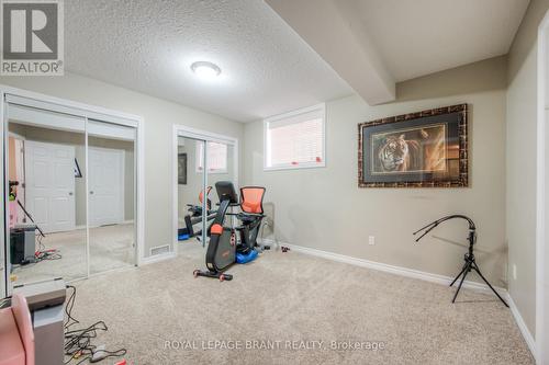 16 Mcguiness Drive, Brantford, ON - Indoor Photo Showing Gym Room