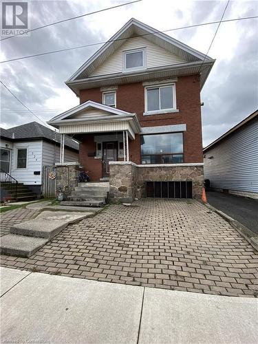 View of front of house featuring covered porch - 522 Roxborough Avenue Unit# #1, Hamilton, ON - Outdoor