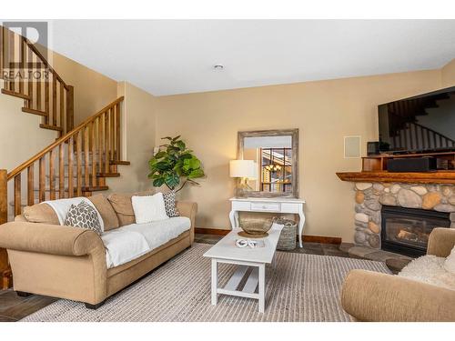 5035 Valley Drive Unit# 44, Sun Peaks, BC - Indoor Photo Showing Living Room With Fireplace