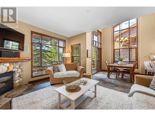 5035 Valley Drive Unit# 44, Sun Peaks, BC - Indoor Photo Showing Living Room With Fireplace