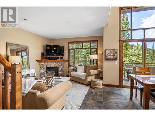 5035 Valley Drive Unit# 44, Sun Peaks, BC - Indoor Photo Showing Living Room With Fireplace