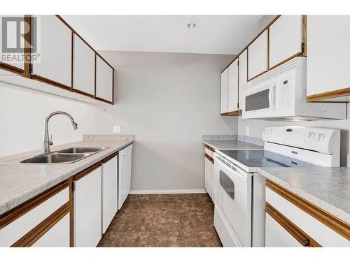 338 Nicola Street Unit# 310, Kamloops, BC - Indoor Photo Showing Kitchen With Double Sink