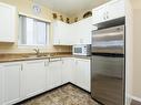 409-1683 Balmoral Ave, Comox, BC  - Indoor Photo Showing Kitchen With Double Sink 